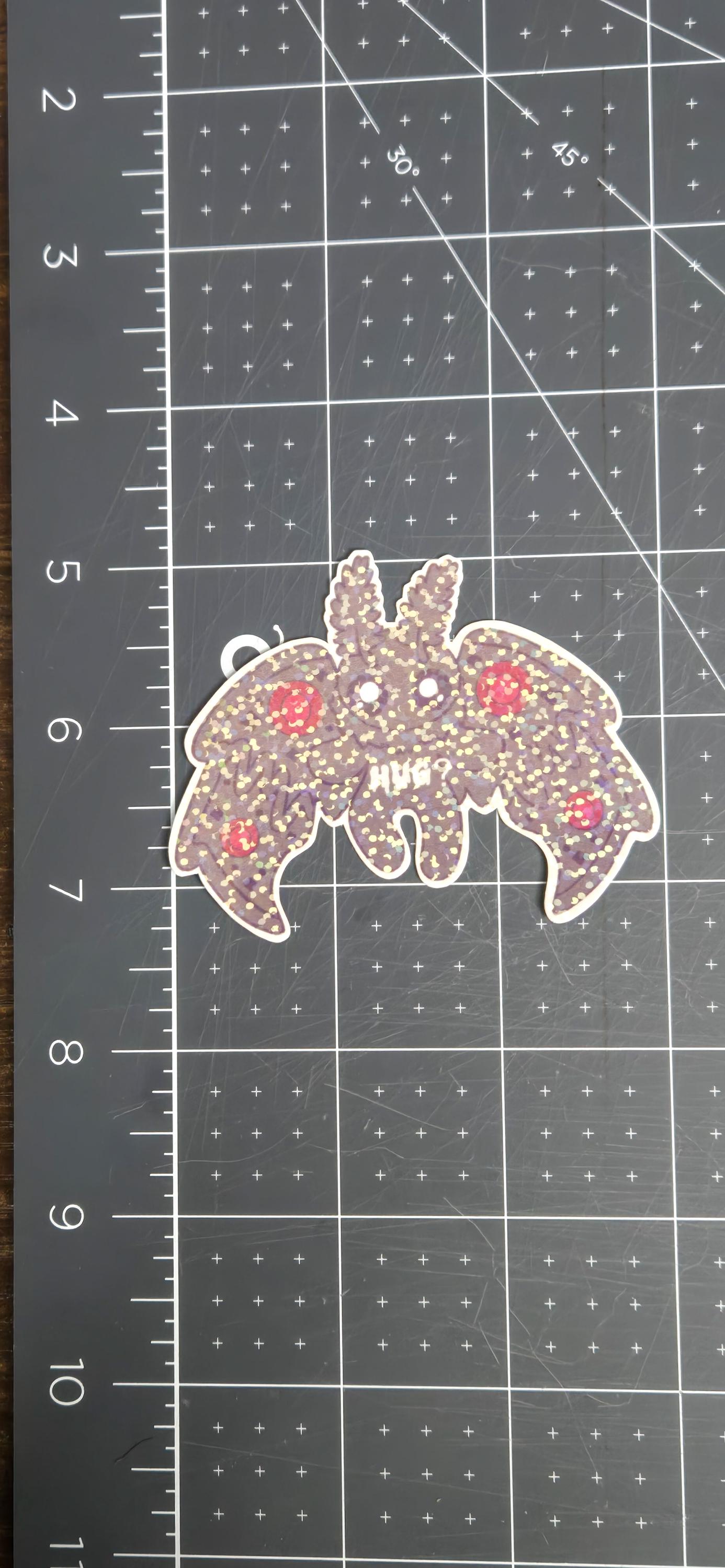 Flying Moth Man Cryptid Hug Glitter Die Cut Bujo Journal Planner Sticker